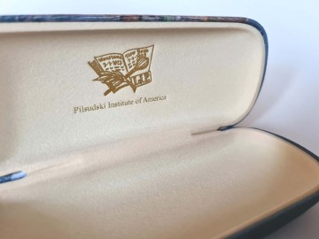 Premium quality eyeglass case with Institute's logo